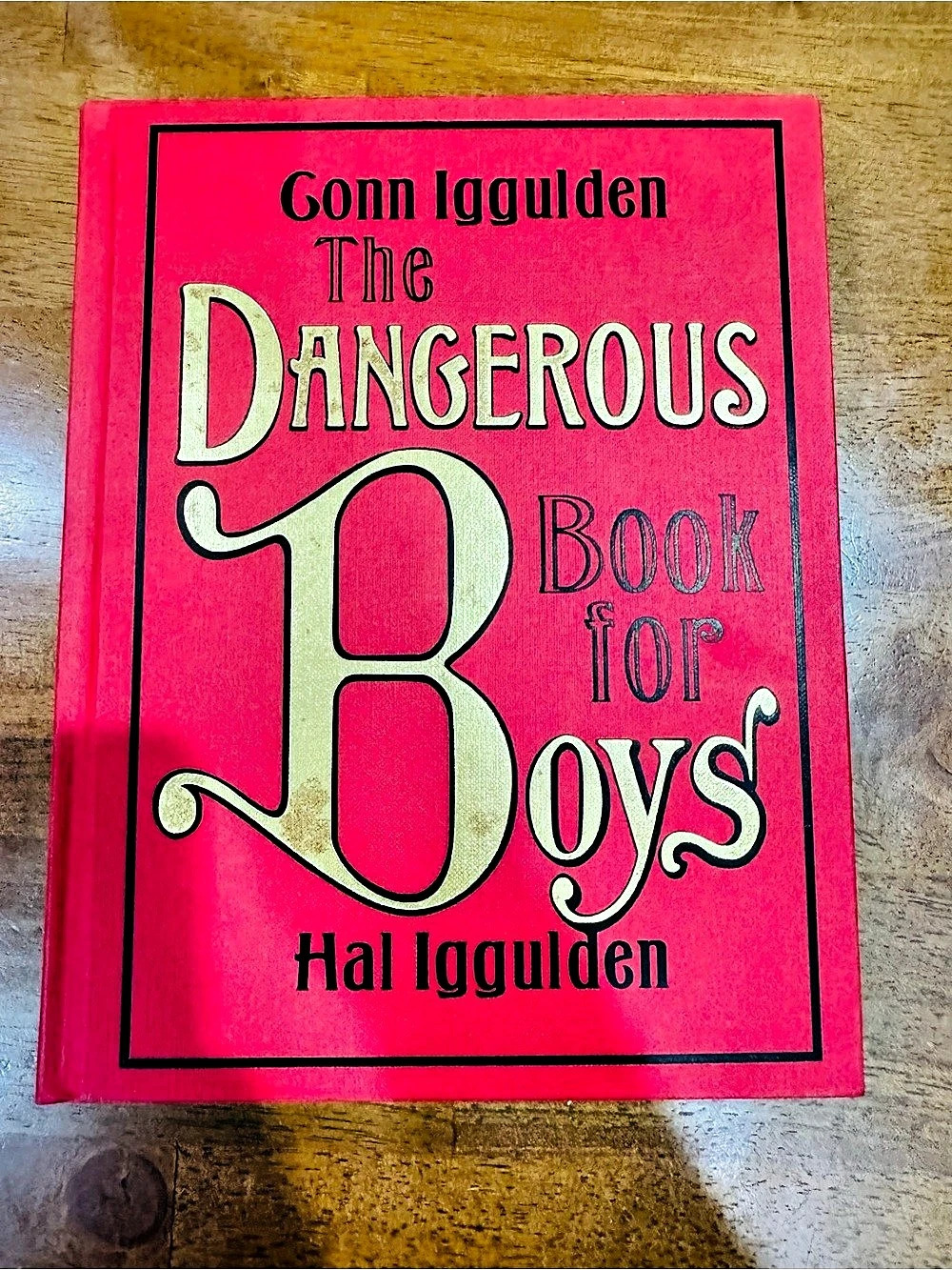 Collins The Dangerous Book for Boys Illustrated Hardcover Book in Red & Black